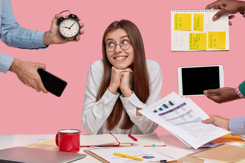 brunette-woman-sitting-desk-surrounded-with-gadgets-papers-3-1024x683 Overcoming Stress in Today's Youth